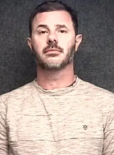 Mugshot of Pastor John-Paul Miller.