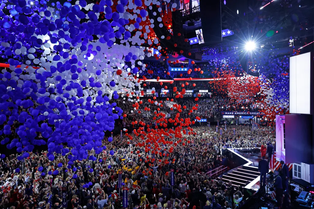 Balloons in red, white, and blue fall over a crowd at the Republican National Convention.