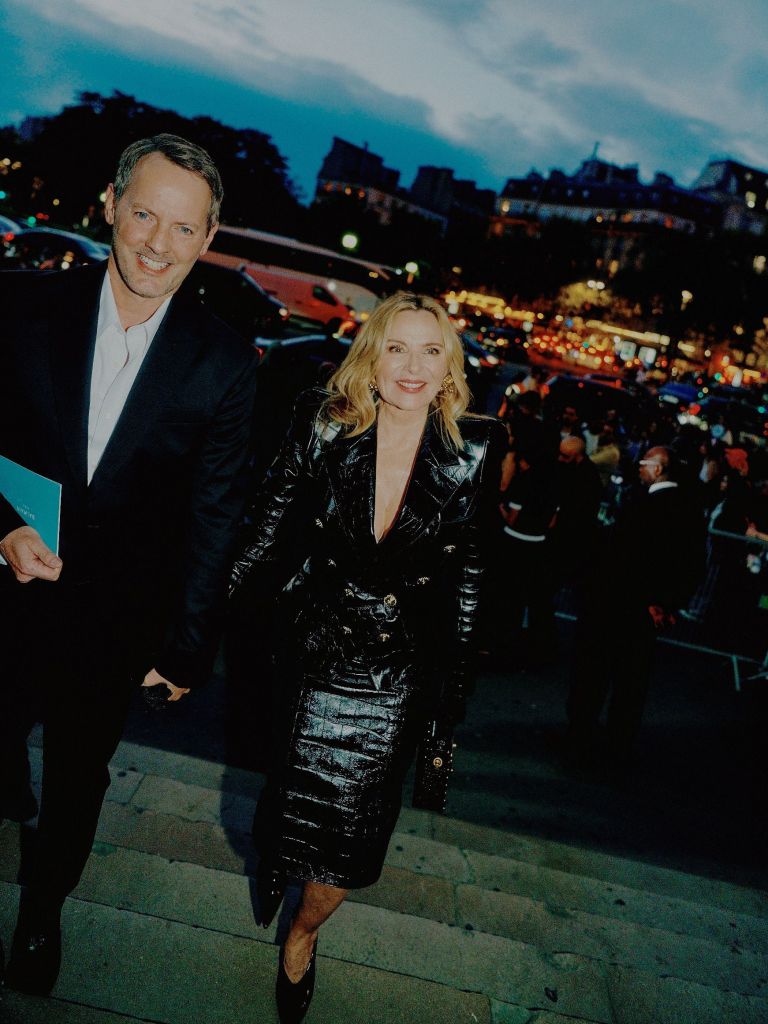 Russell Thomas and Kim Cattrall attend the Balmain Womenswear Spring/Summer 2024 show.