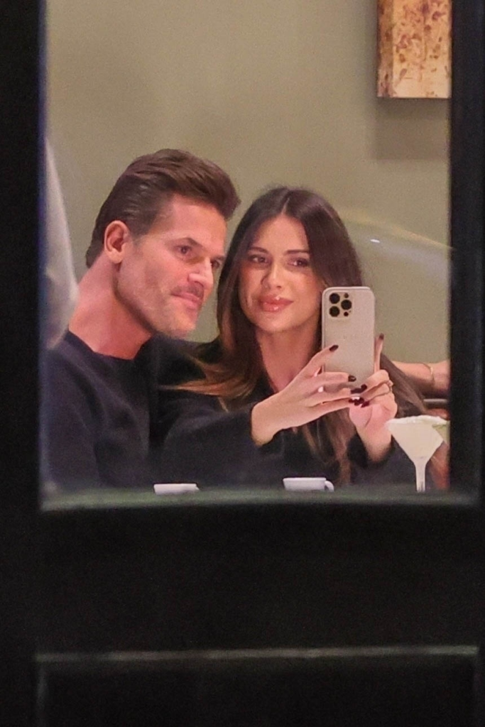 Demi Engemann taking a selfie with her husband Brett Engemann during a dinner date.