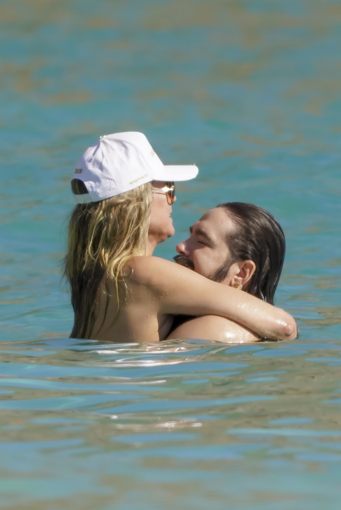 Heidi Klum and Tom Kaulitz embrace in the ocean.