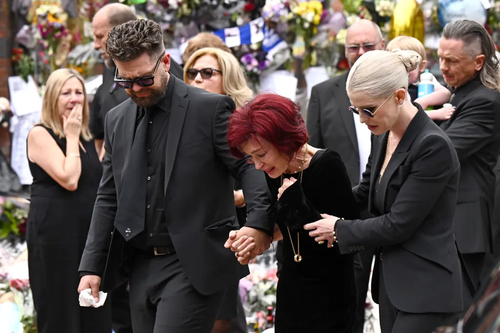 Jack Osbourne, Sharon Osbourne, and Kelly Osbourne arrive to view tributes to the late Ozzy Osbourne in Birmingham.