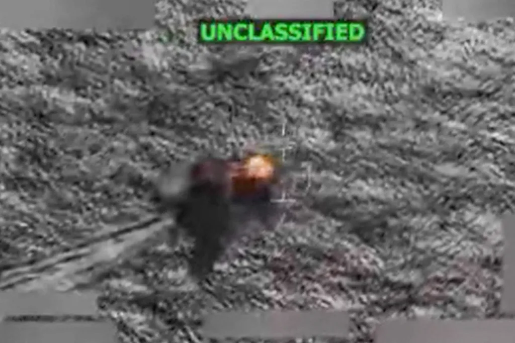 Screenshot from a video showing an explosion at sea.