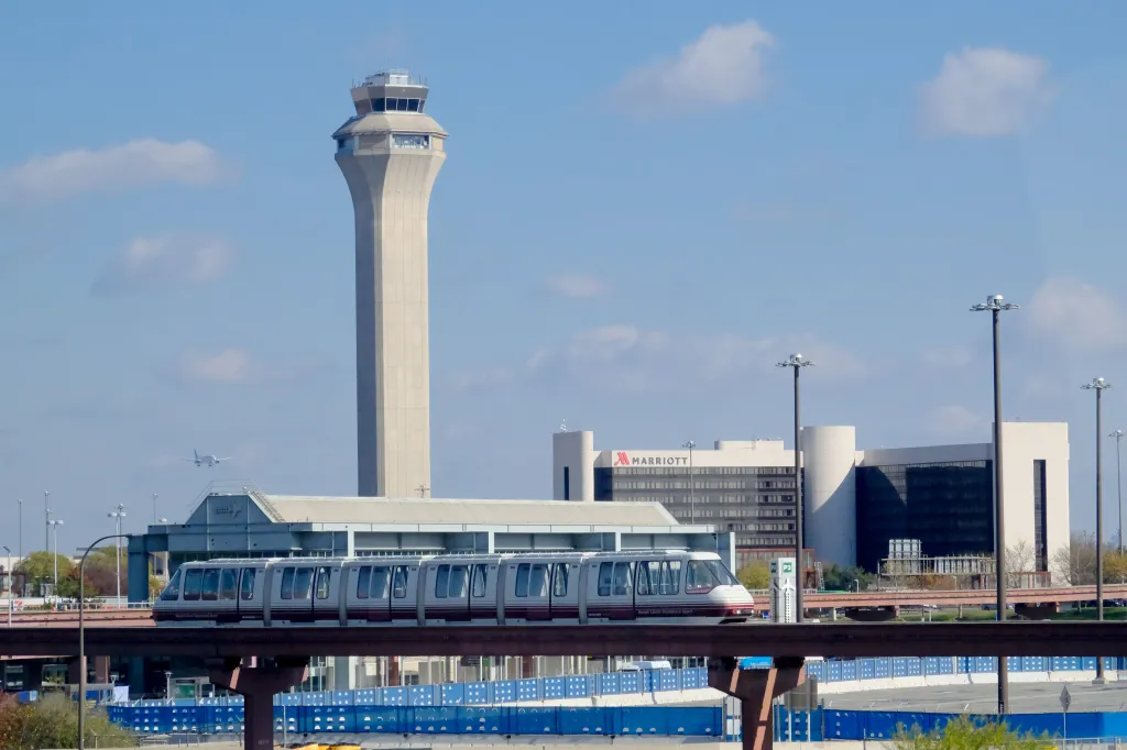 An empty AirTrain and the control tower are seen at Newark Liberty International Airport.