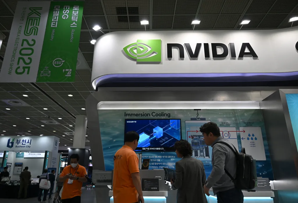 Visitors look at a display at the NVIDIA booth at the Korea Electronics Show 2025.