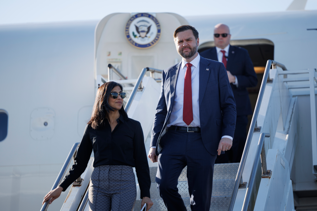 Vice President JD Vance and his wife Usha Vance exit Air Force Two on December 16, 2025 at Lehigh Valley International Airport in Allentown, Pennsylvania.