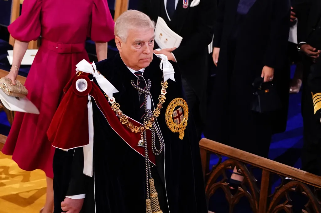 Prince Andrew, Duke of York, wearing ceremonial robes and regalia at Westminster Abbey.