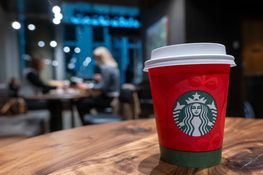 A red cup of Starbucks coffee.