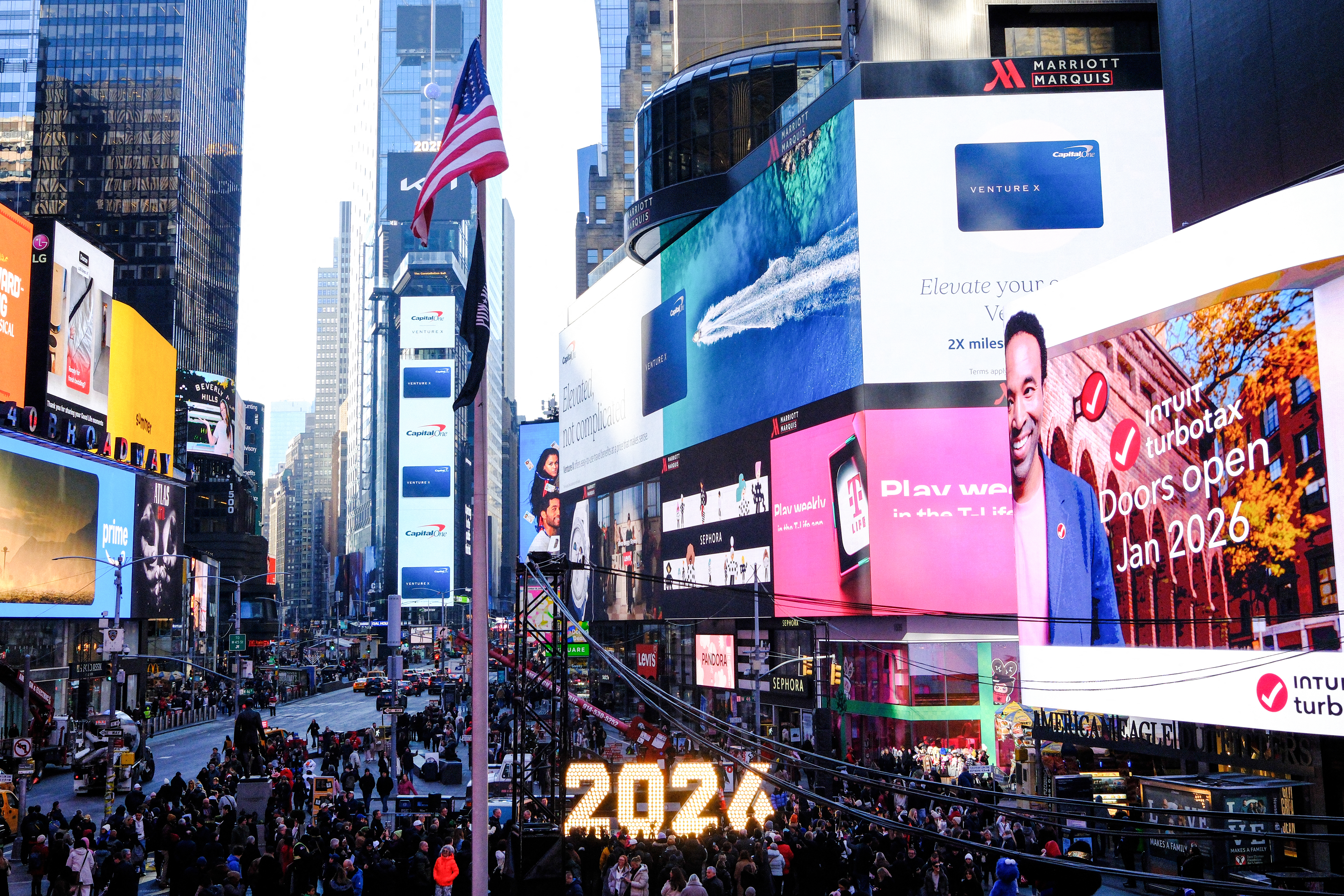People gathered around the illuminated 
