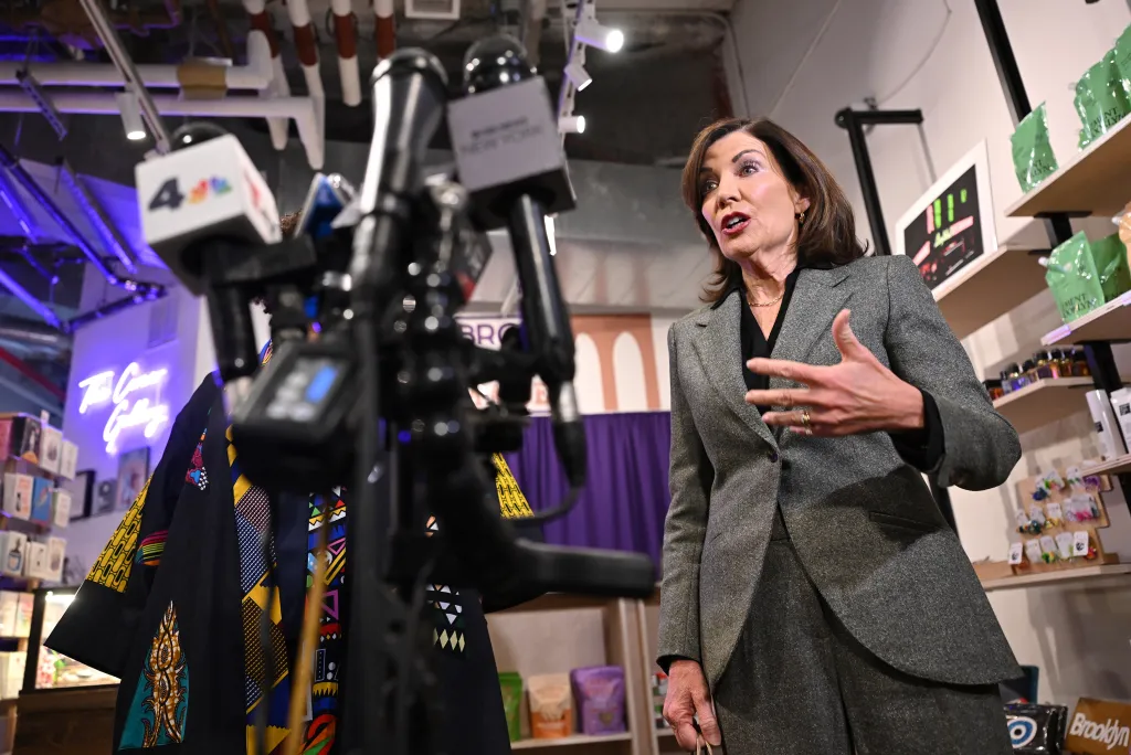 Governor Kathy Hochul speaking at a press conference in Brooklyn.