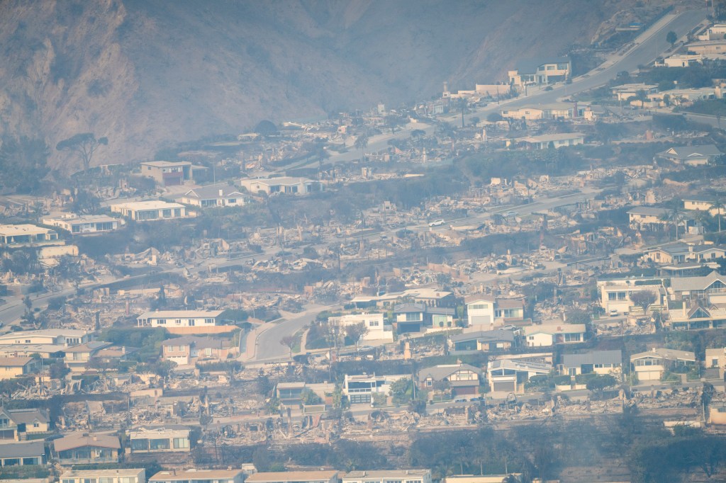 Palisades, California. View from a helicopter of homes destroyed by the wildfire in Pacific Palisades, California.