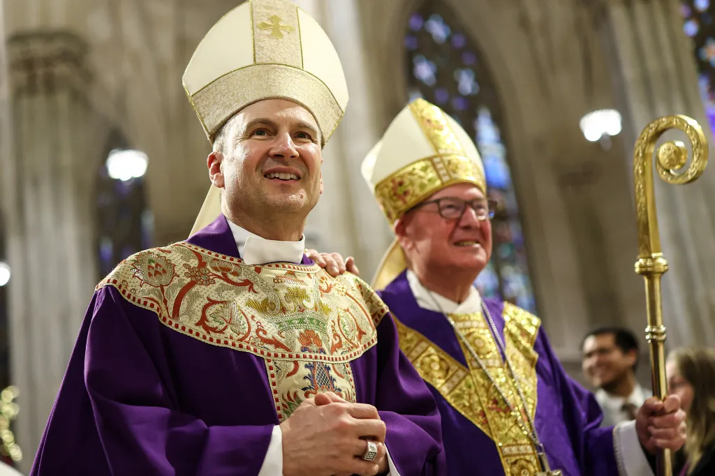 Cardinal Timothy Dolan and Ronald Hicks leading a mass at St. Patrick's Cathedral.
