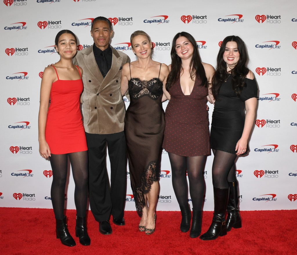 T.J. Holmes, Amy Robach, Sabine Holmes, Ava McIntosh, and Annie McIntosh at the iHeartRadio Jingle Ball.