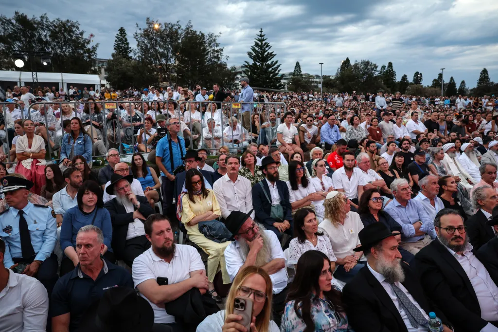 Thousands of people attend the vigil at Bondi Beach.
