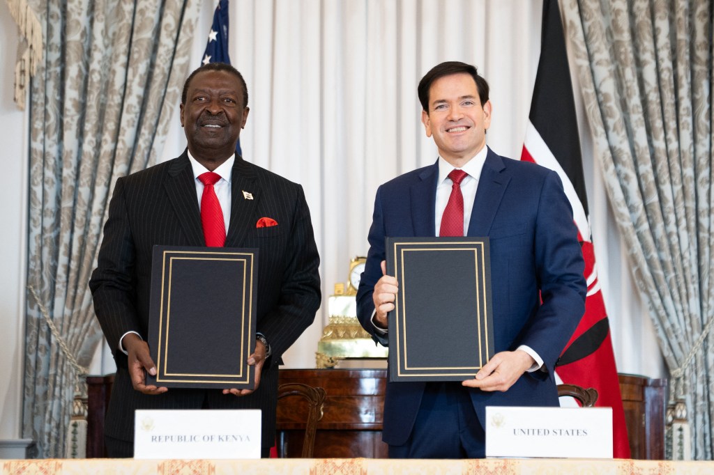US Secretary of State Marco Rubio (R) and Kenyan Prime Cabinet Secretary Musalia Mudavadi (L) participate in a Health Framework of Cooperation signing ceremony at the State Department in Washington, DC on December 4, 2025.