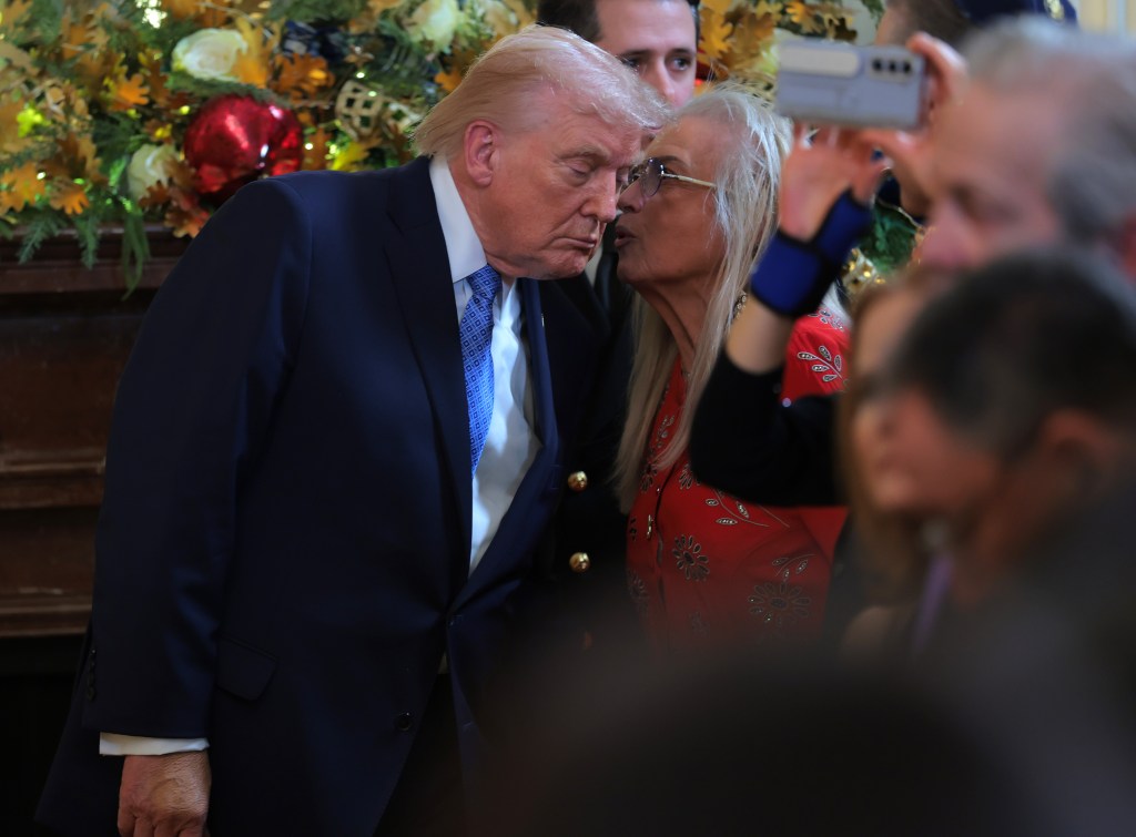 Miriam Adelson talking with Donald Trump at a Hanukkah Reception.