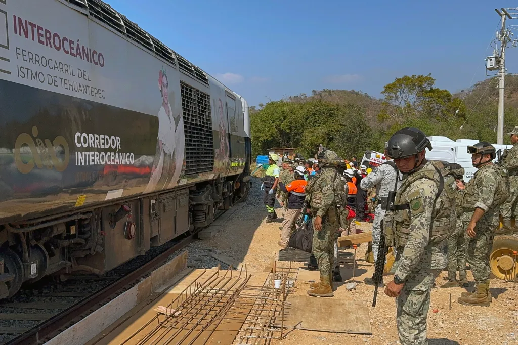 Mexican Army soldiers and Civil Protection members rescue passengers from the Interoceanic train that derailed in Oaxaca, Mexico.