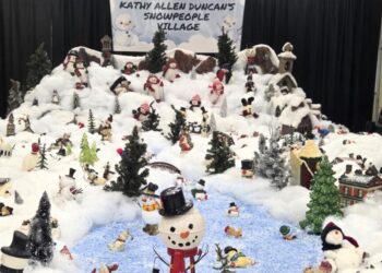 In tribute to late wife, husband rebuilds her snowman village at Kansas mall