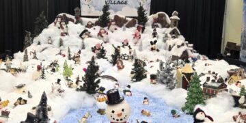 In tribute to late wife, husband rebuilds her snowman village at Kansas mall