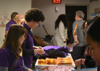 At a giveaway for the unhoused, free meals, handwarmers and clothes