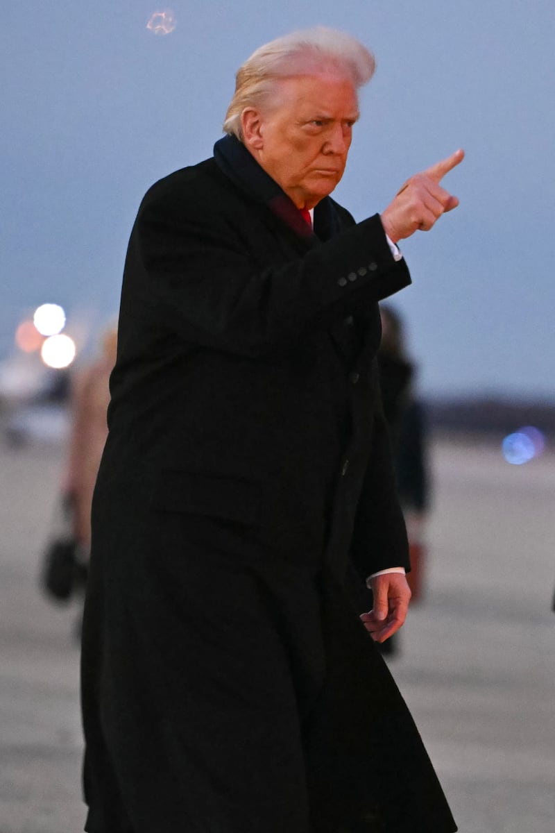 US President Donald Trump walks to board Air Force One at Joint Base Andrews, Maryland on December 9, 2025, en route to deliver remarks in Pennsylvania.