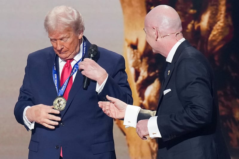 US President Donald Trump (left) with FIFA President Giovanni Infantino (right)
