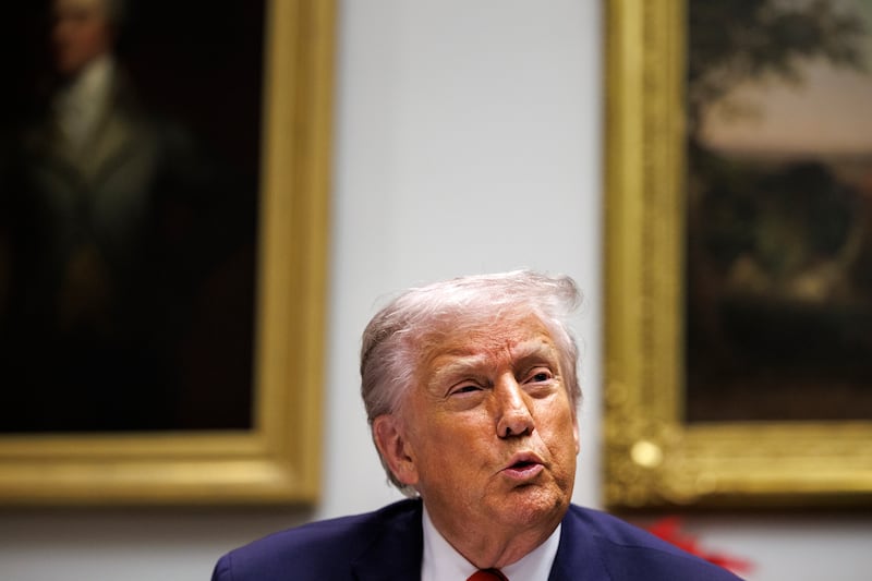 President Donald Trump hosts a roundtable event with business leaders