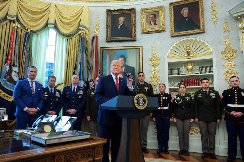 President Donald Trump speaks during a ceremony on December 15 to present the Mexican Border Defense Medal to service members who had deployed to the U.S.-Mexico border.