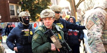 Trump’s Top Goon Parades Around With Gun in Return to Chicago