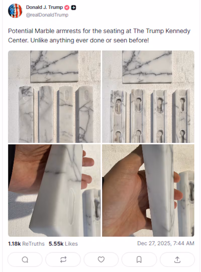 President Donald Trump shows off his new marble armrests for the Kennedy Center.