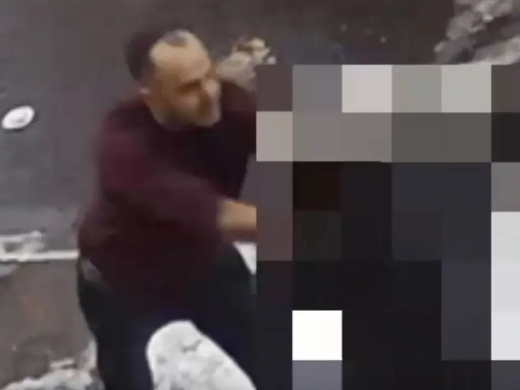 Police said the man grabbed the 10-year-old and slammed his head into a car windshield after a 