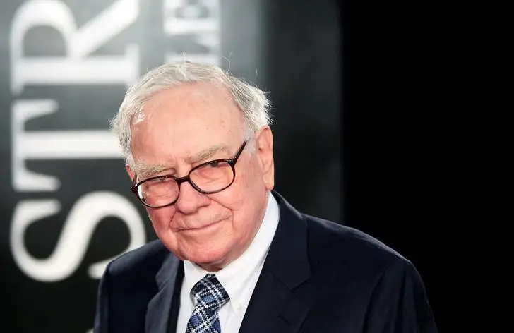Investor Warren Buffet arrives for the premiere of the film 