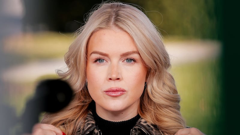 WASHINGTON, DC - DECEMBER 16: White House Press Secretary Karoline Leavitt participates in a television interview outside the White House on December 16, 2025 in Washington, DC. After the interview Leavitt spoke to reporters briefly about a recent Vanity Fair article about members of staff in U.S. President Donald Trump's administration.