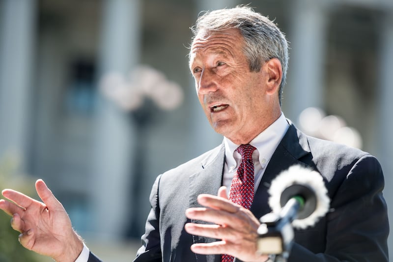 COLUMBIA, SC - SEPTEMBER 16: Former South Carolina Gov. Mark Sanford speaks to the media with a cardboard cutout of President Donald Trump during a campaign stop at the state house on September 16, 2019 in Columbia, South Carolina. Sanford is running against the Republican president in the primary election. (Photo by Sean Rayford/Getty Images)