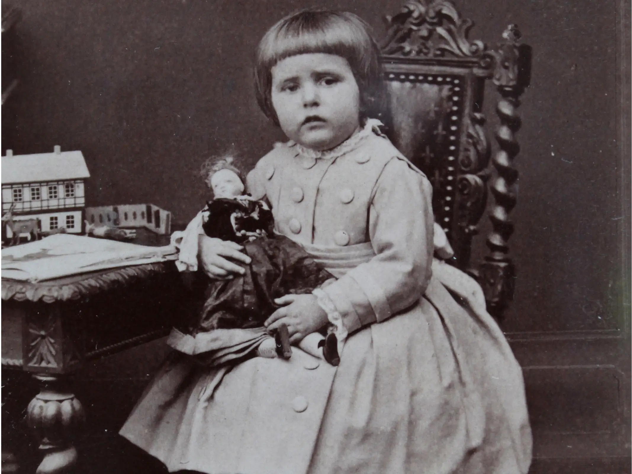 children with doll 1870