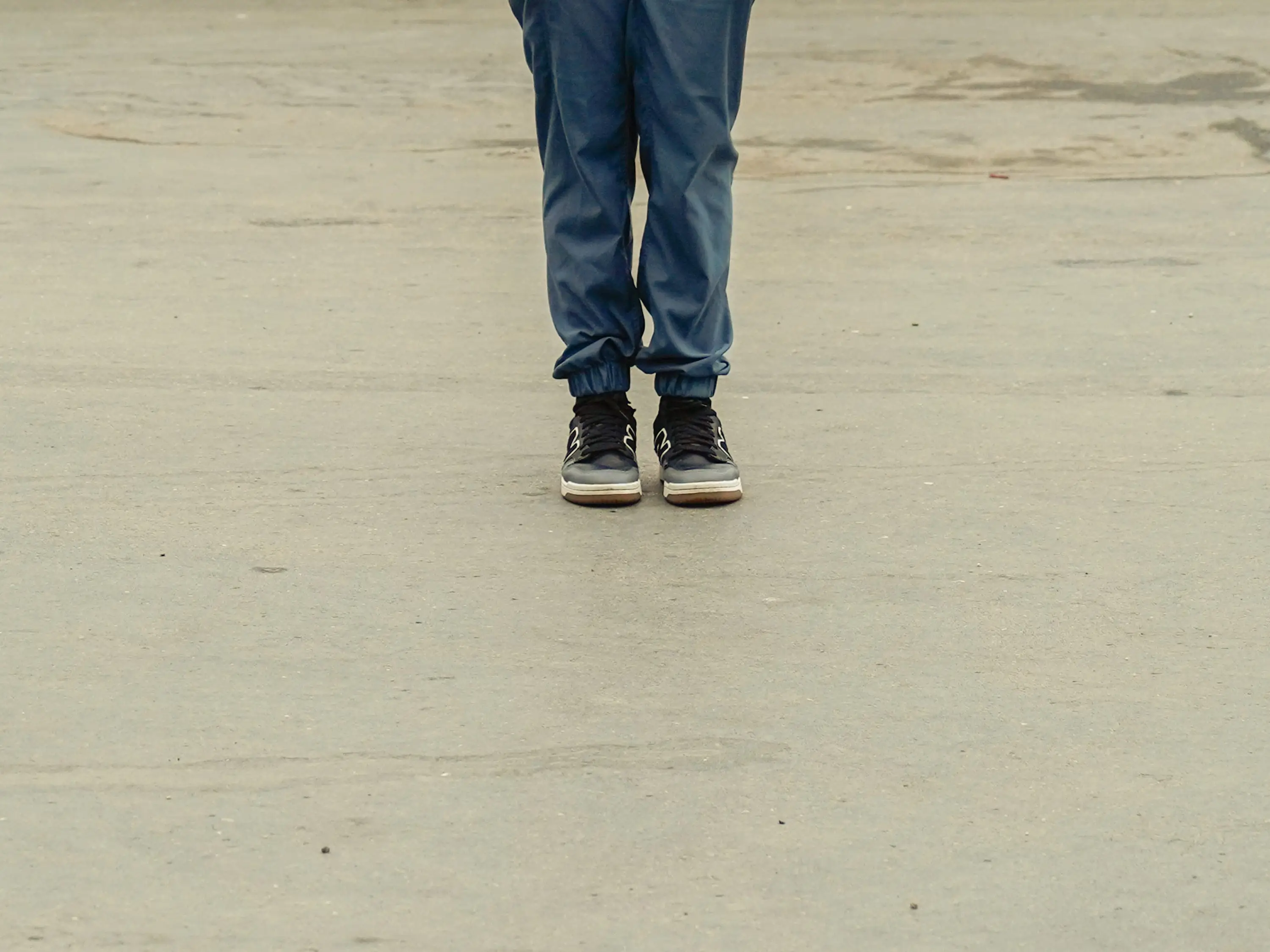 The author wears her black sneakers in Milan