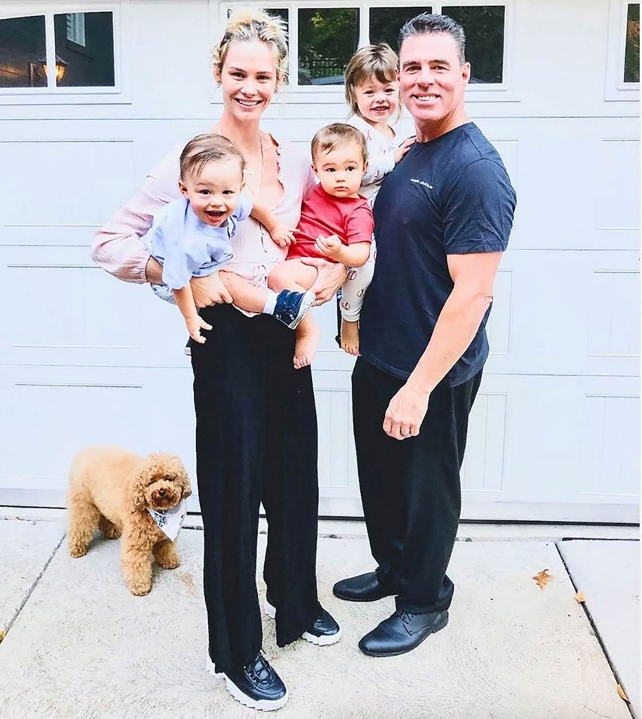 Meghan King with Jim Edmonds and their three children, and a dog.