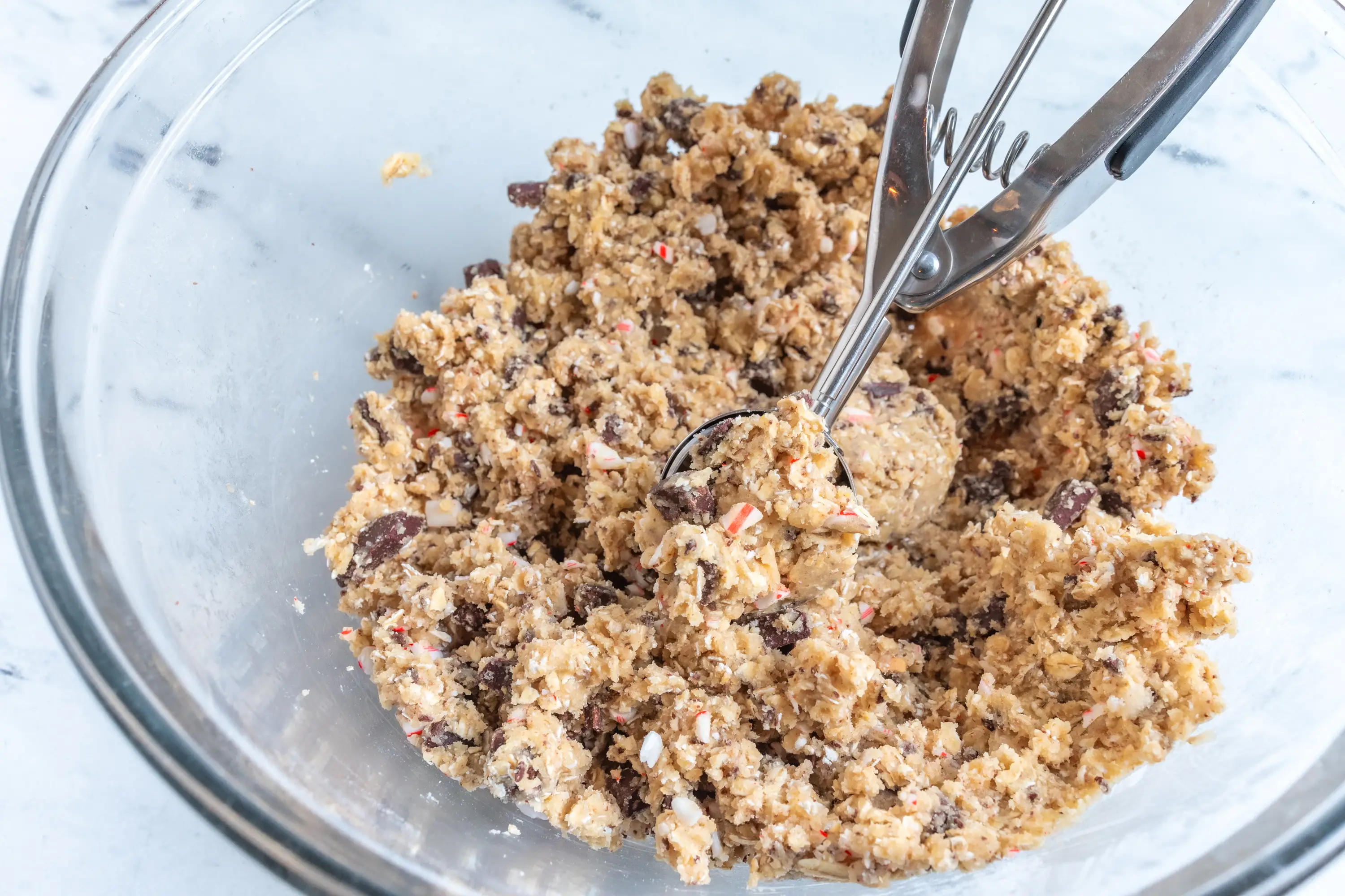 Cookie dough scoop in peppermint chocolat chunk dough