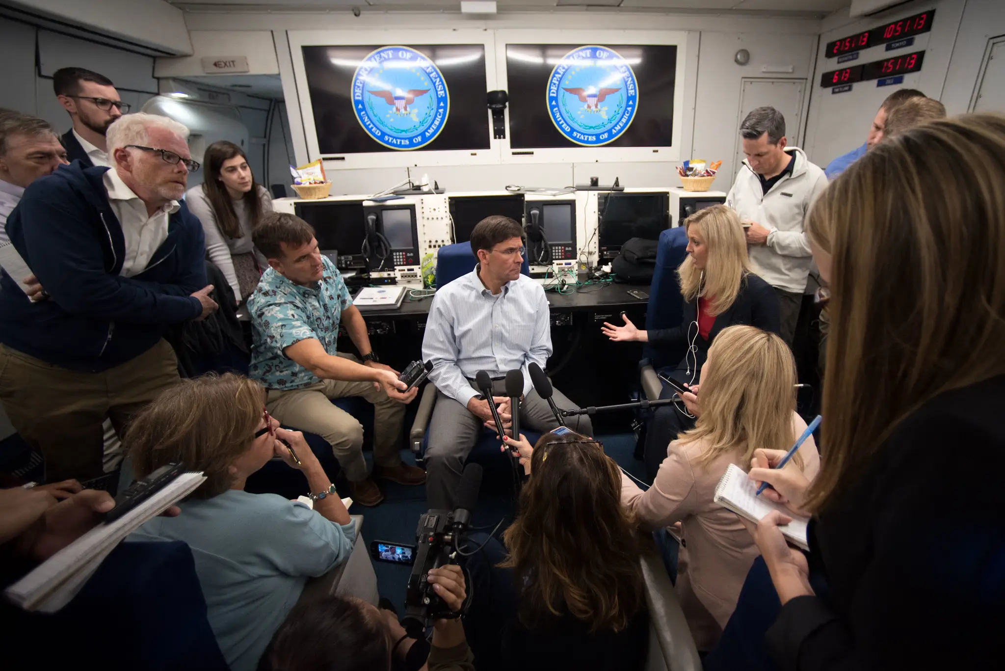 Secretary of Defense Dr. Mark T. Esper speaks to reporters on board an E-4B plane.