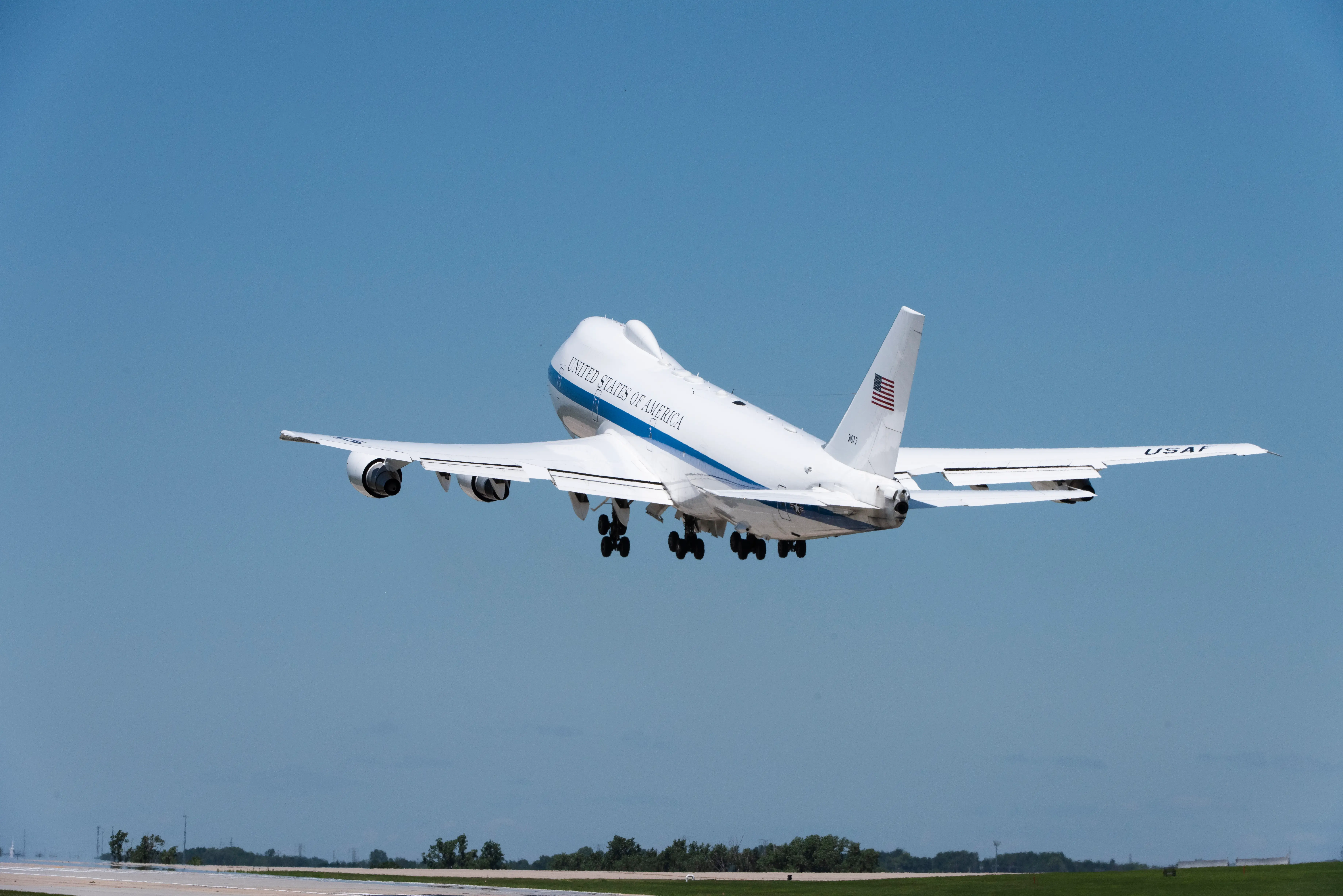 An E-4B plane takes off.