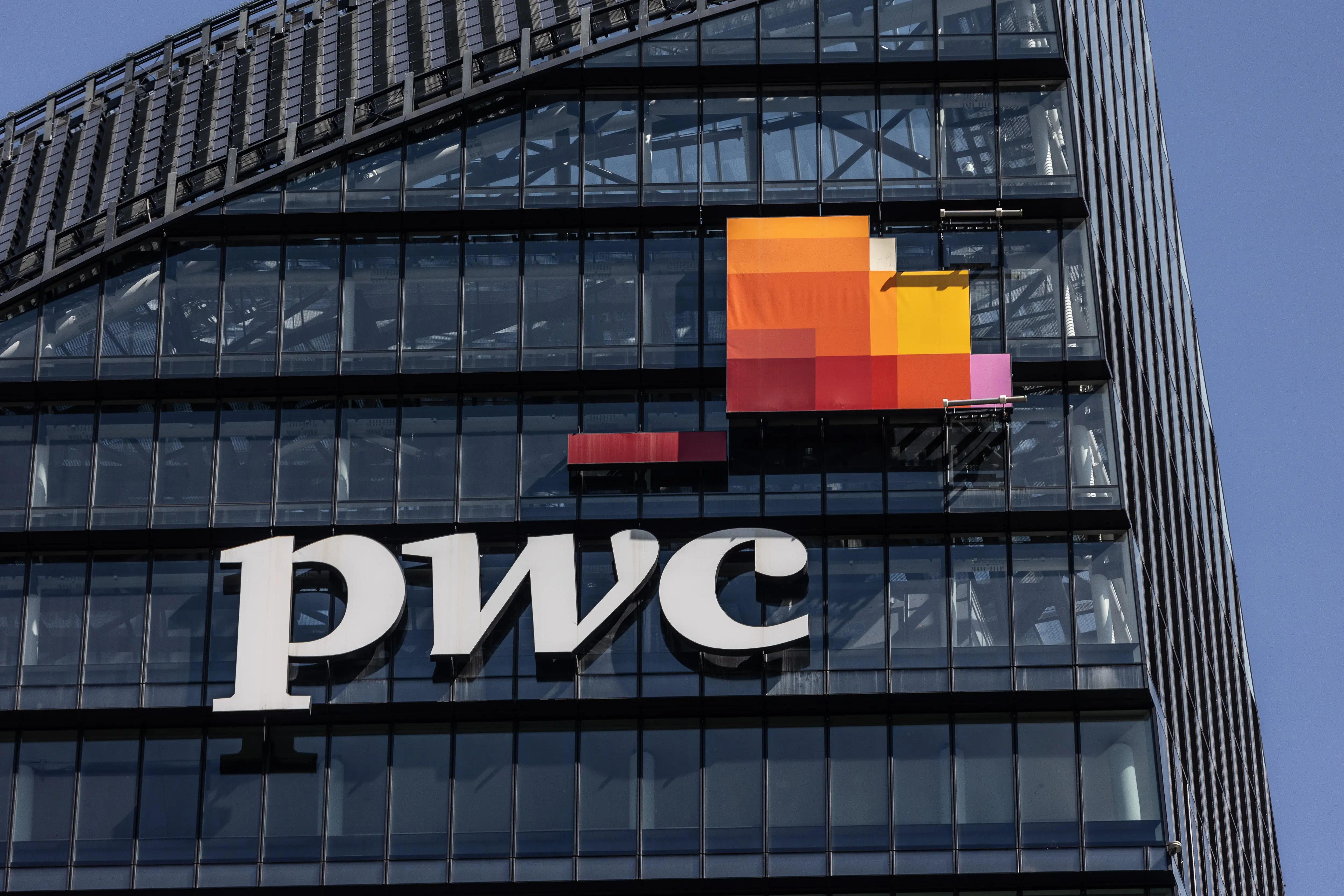 PwC logo on building