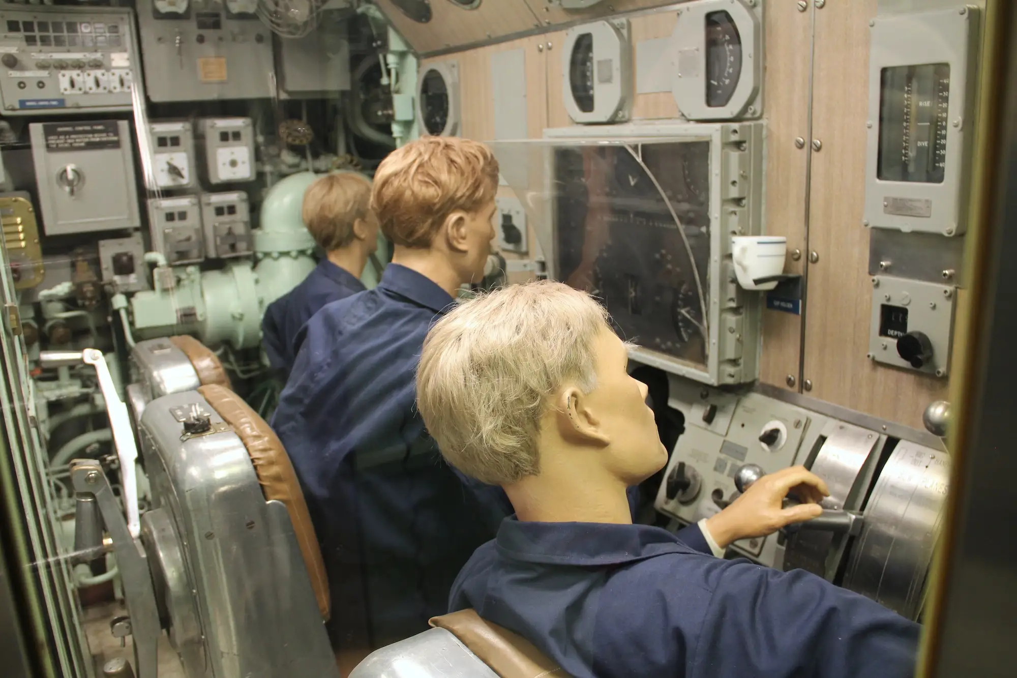 Mannequins of crew members in the control room.