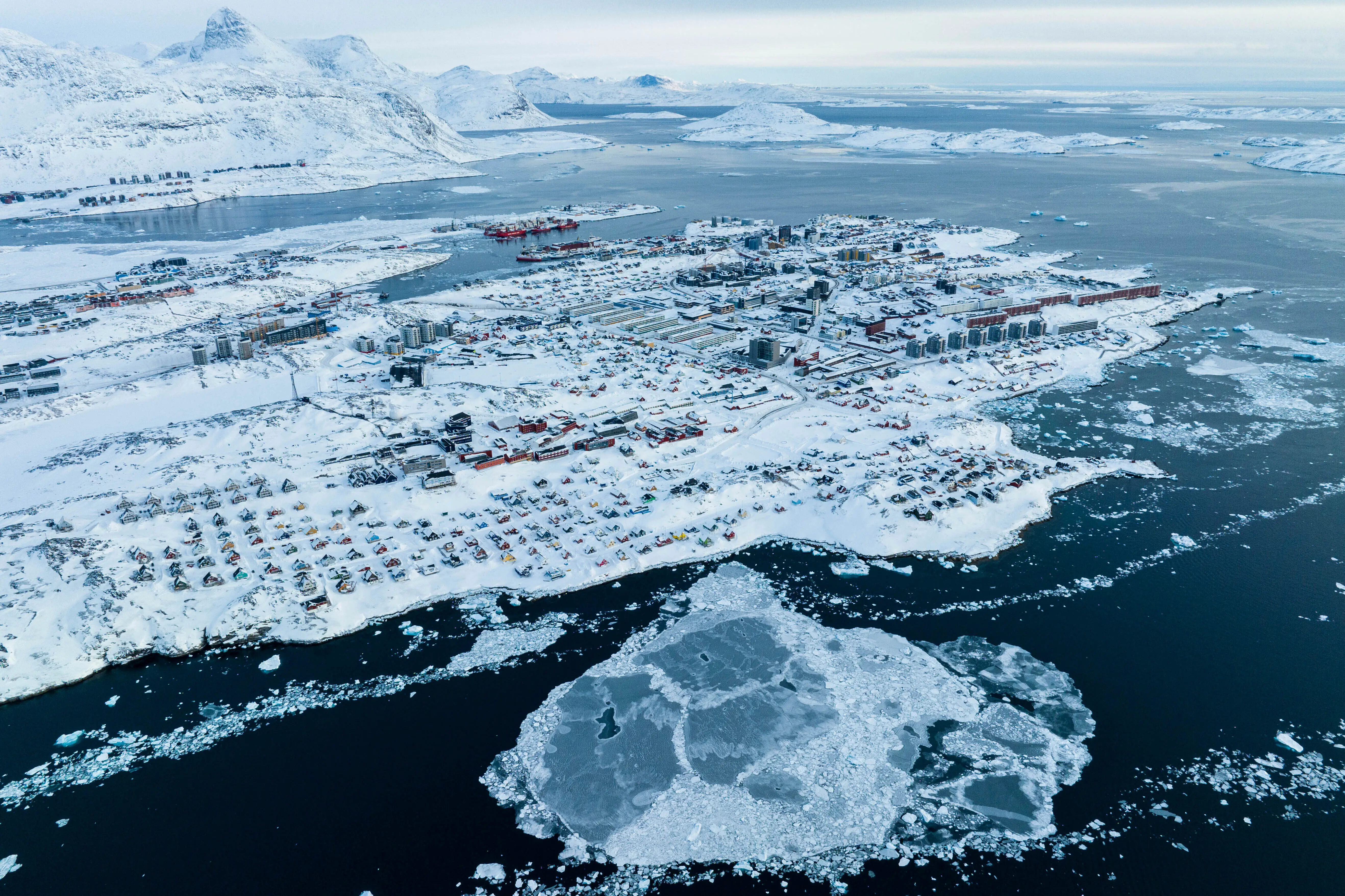 Houses and buildings on an inlet in icy water
