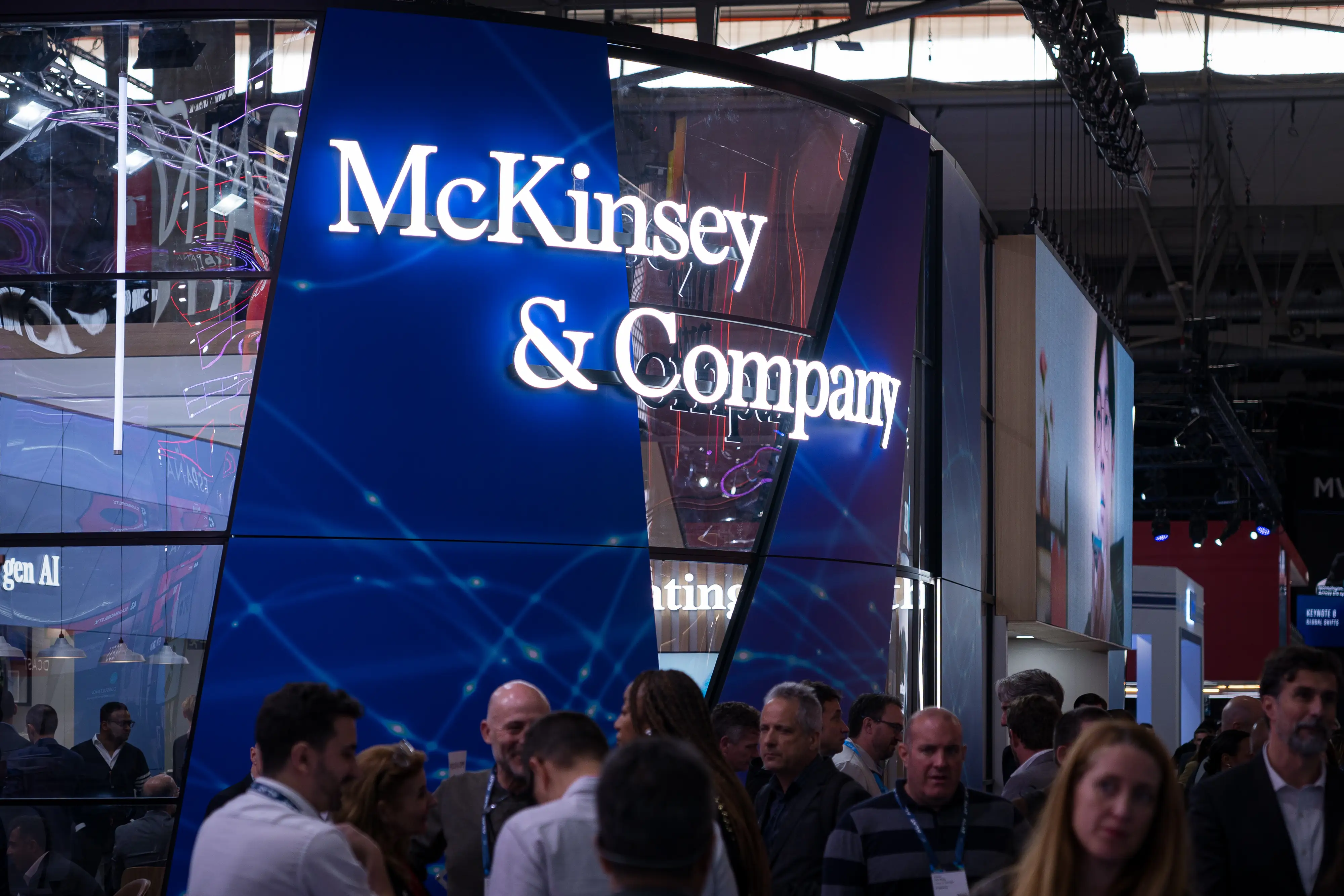 Mckinsey logo over a crowd of people