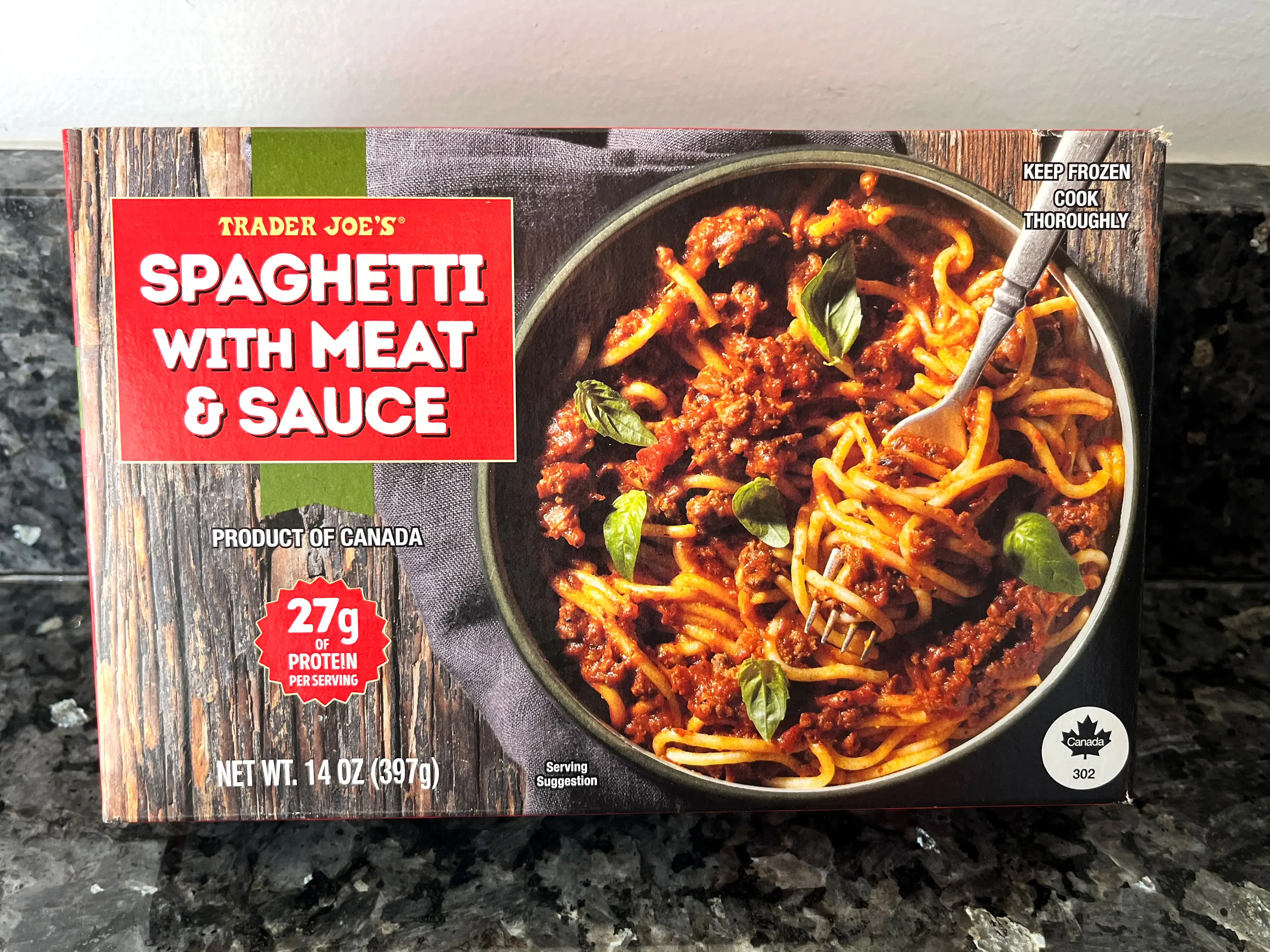 A box of Trader Joe's spaghetti with meat sauce.