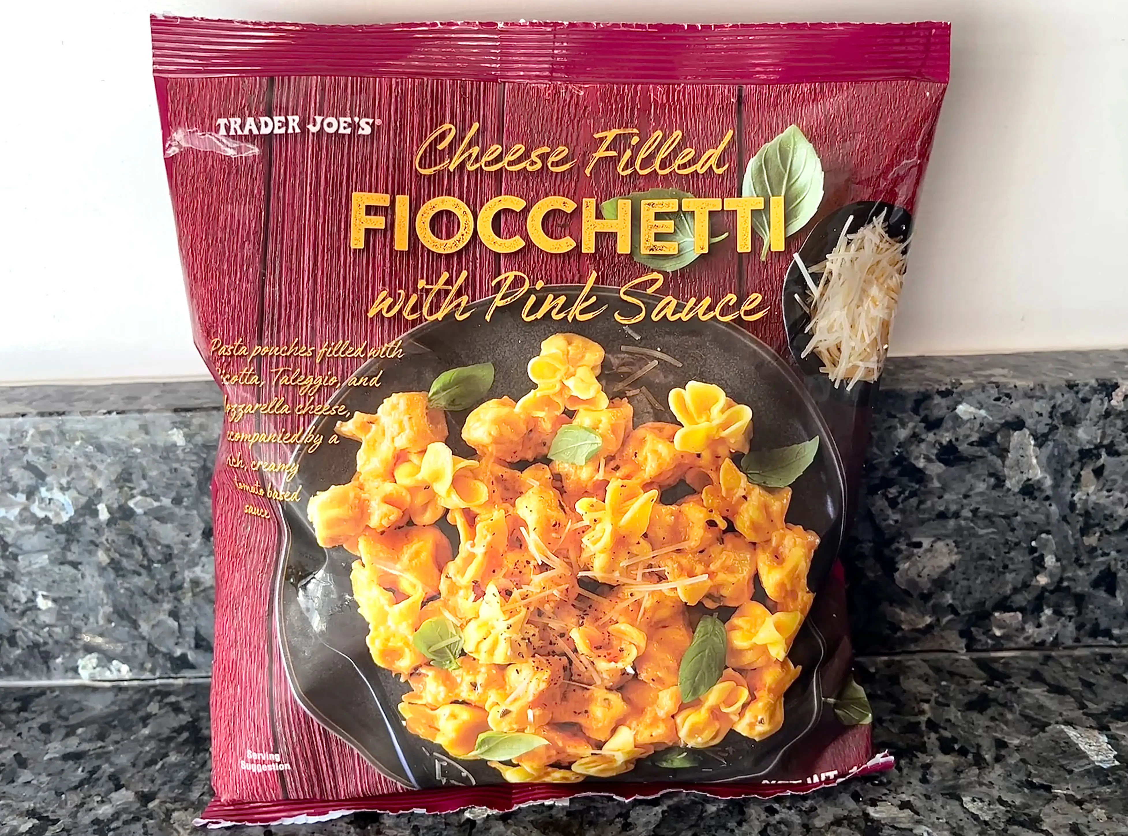 A bag of Trader Joe's cheese-filled fiocchetti with pink sauce.