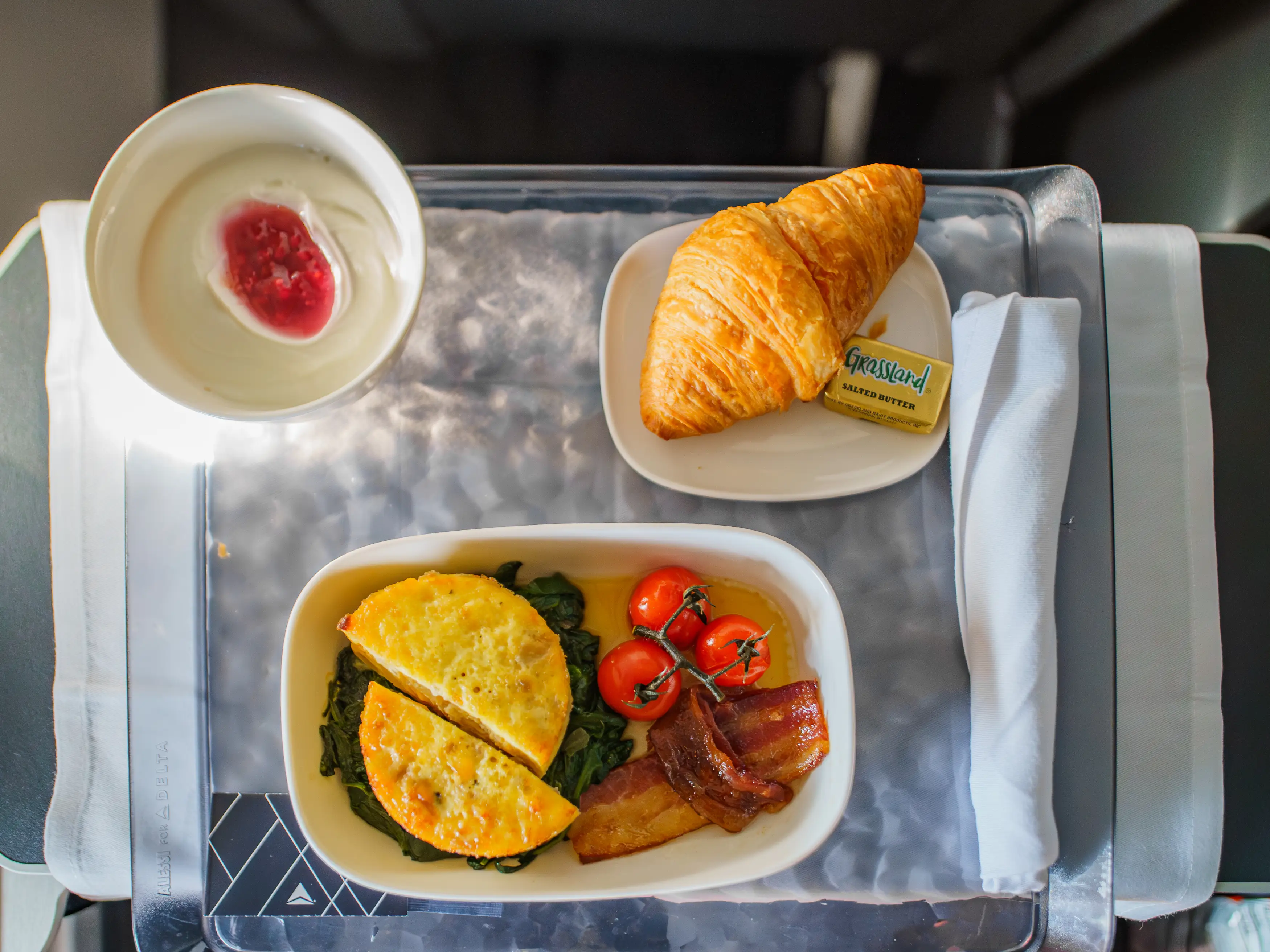 An aerial view of breakfast on a first-class flight with Delta