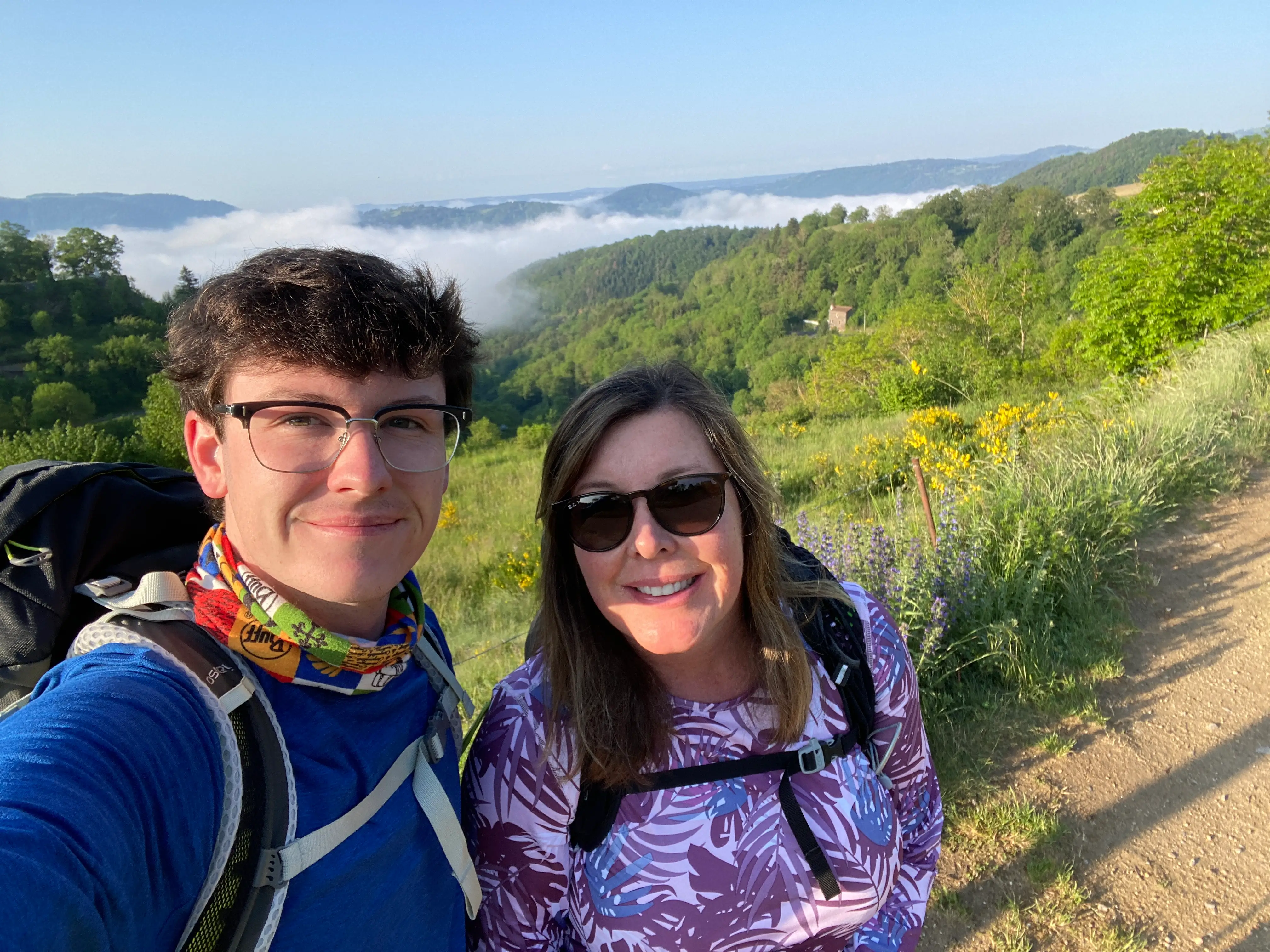 The author and his mom posing for a selfie on their route in 2023.