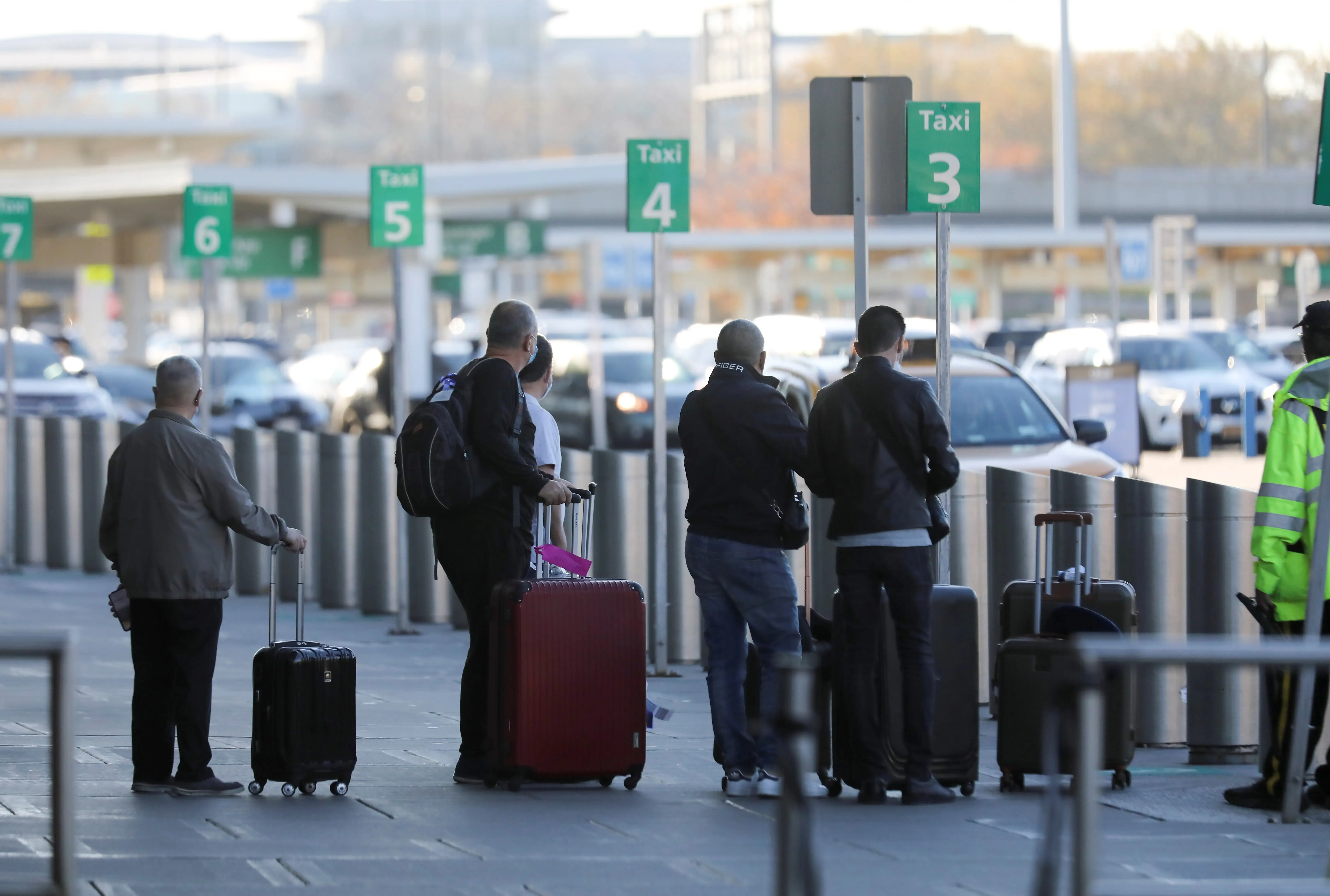 Customers standing at the taxi lines in New York JFK.