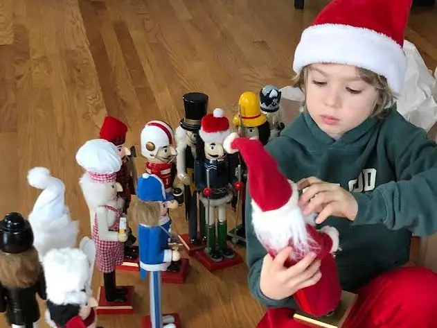 Boy playing with nutcrackers